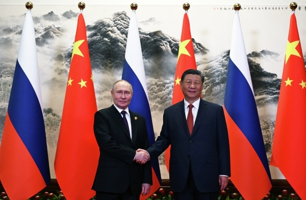 Утка и устрицы: Российской делегации в честь визита Путина предложили блюда китайской кухни