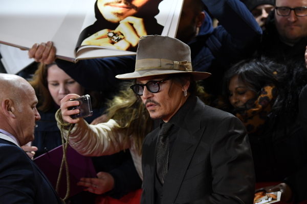 Депп не пострадает: Голливуд ждет слияние Netflix и Warner Bros. Discovery